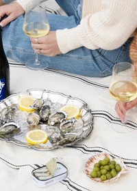 Oysters on ice with Delphinium wine